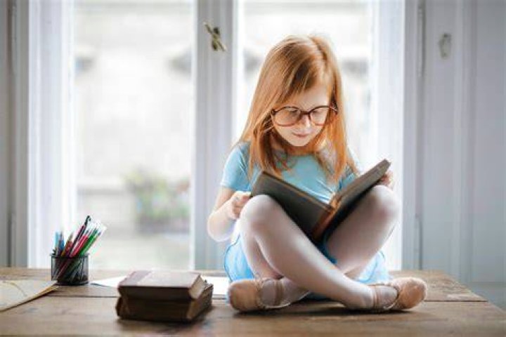 Free Images book, girl, reading, vacation, holiday, candle, christmas